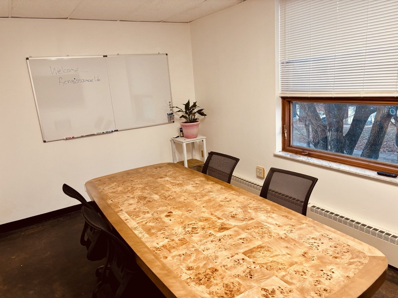 AI Lab Coworking conference room whiteboard and presentation area