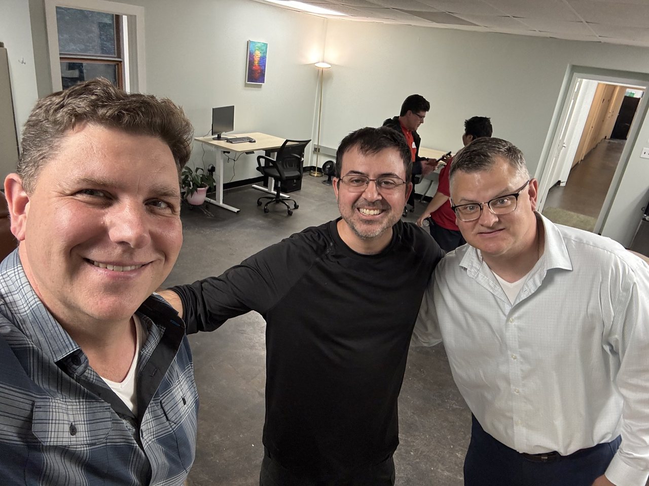 Three meetup attendees smiling for a selfie in June
